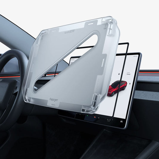AGL10654 - Tesla Series - Screen Protector GLAS.tR EZ Fit 15.4 showing the alignment tray hovering in front of the screen protector and the vehicle screen monitor