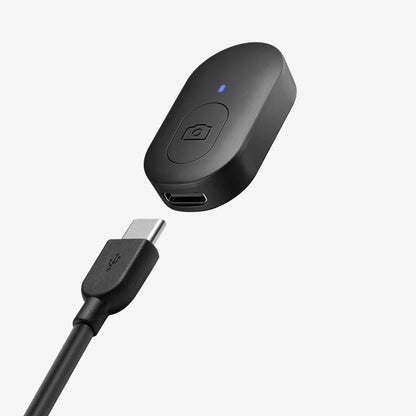 AMP09534 - s581w selfie stick magfit in black showing the usb type cable charger and front of the selfie stick device camera tool