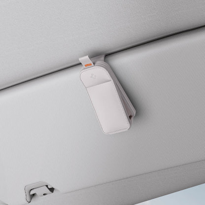 ACP08827 - Visor Leather Sunglass Holder SH101 in Gray showing the front, attached to a car visor