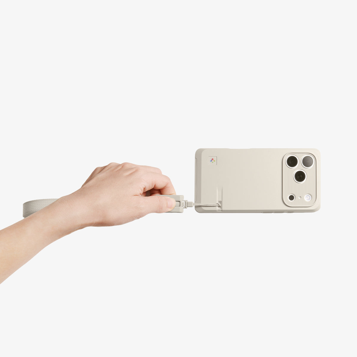 AFA10617 - DA30S LS lanyard strap demonstrating quick release mechanism as hand detaches tether from phone case for fast removal