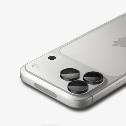 AGL12043 - iPhone 18 Pro Max / iPhone 18 Pro Optik Pro EZ Fit Lens Protector in black showing a close-up of three lens protectors fitted securely over the camera lenses.