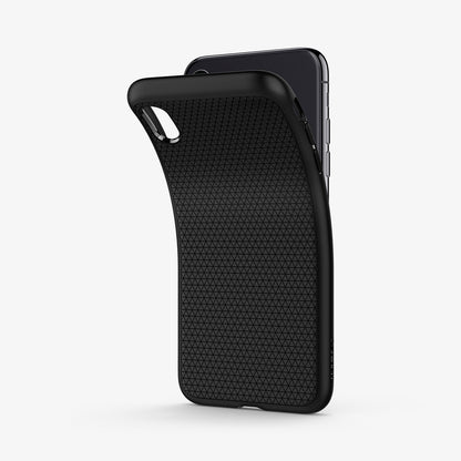 057CS22123 - iPhone XS Case Liquid Air in Matte Black showing the back of soft tpu back case partially peeled from behind a device