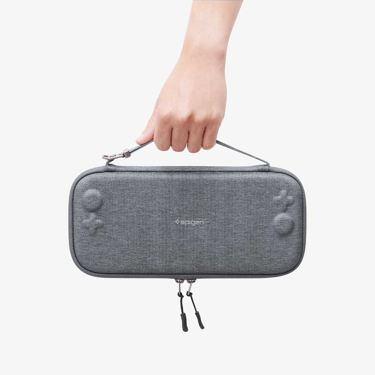 AGP10197 - Nintendo Switch 2 Klasden Pouch 2 in Charcoal Gray showing a person holding the pouch by the strap