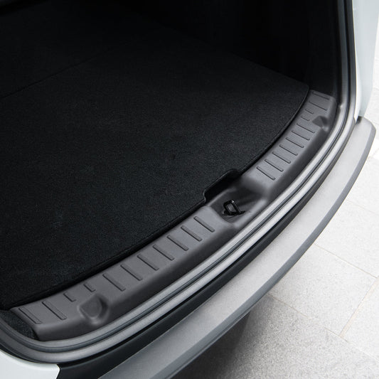 ACP09759 - Tesla Model Y Juniper Trunk Sill Guard | TG100-YJ in black showing the guard installed in trunk