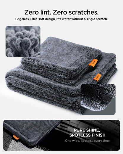 ACP11389 - Folded Spigen microfiber towels with close-up insets showing the soft, edgeless fiber loops that prevent scratches