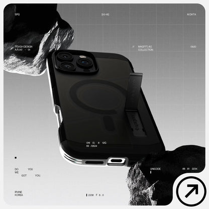 ACS08509 - iPhone 16 Pro Case Tough Armor AI (MagFit) in Frost Black has tough design and showing between the rock.