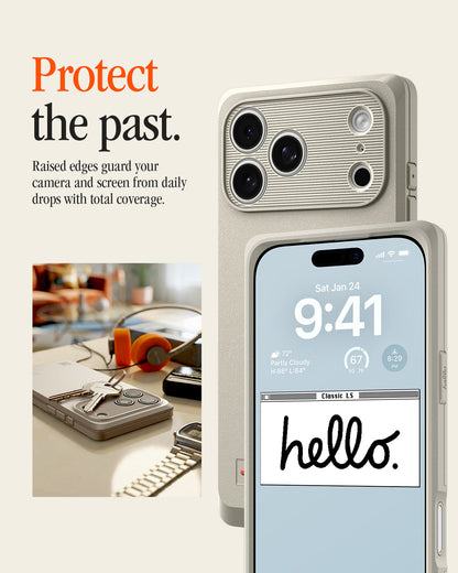 ACS10479 - iPhone 18 Pro / iPhone 17 Pro Classic LS MagFit case showing the case's raised camera bezel and screen edge, with a lock screen reading "Classic LS hello." beside a desk scene.