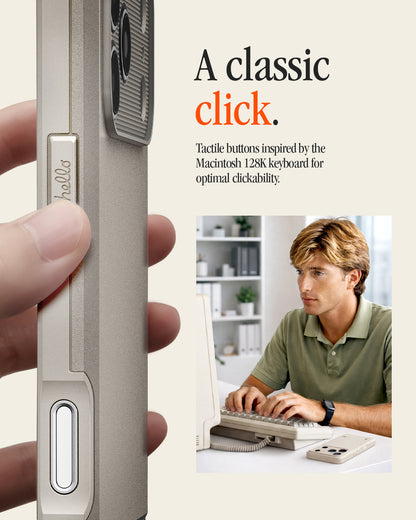 ACS10478 - iPhone 17 Pro Max Classic LS MagFit case showing a hand pressing the case's tactile side button, next to a man typing on a vintage Macintosh keyboard.