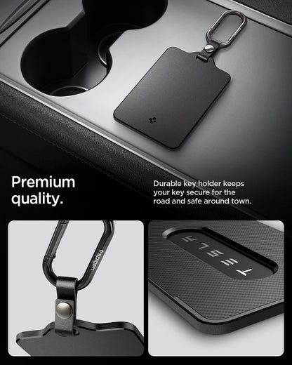 ACP07175 - Tesla key card holder with matte black finish and carabiner clip placed in Tesla center console showing premium build quality and close-up details of clip and card window